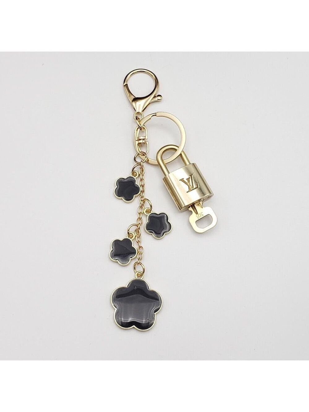 Authentic Louis Vuitton Lock & Key with Unbranded Flower Charm, Keychain